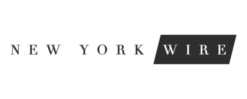 The image features the text "NEW YORK WIRE" in all capital letters. "NEW YORK" is in a regular font, while "WIRE" is in a bold, white font against a black tilted rectangle background. The overall design is minimalistic and monochromatic.
