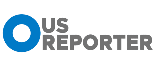The image shows the logo for "US Reporter." The logo consists of the word "US" in grey and "Reporter" in black. The "O" in "US" is a large blue circle, symbolizing the planet Earth. The overall design is modern and clean.